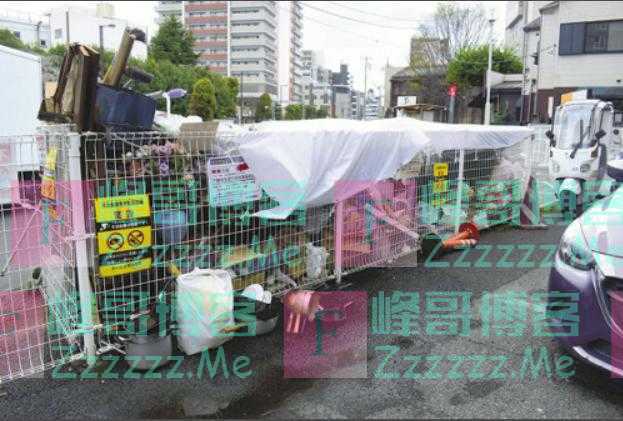 日本一闹市区藏“垃圾山” 市政府束手无策（图）